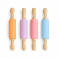 Kids rolling pin by Loomie, featuring colorful handles and a smooth wooden surface for creative baking fun.